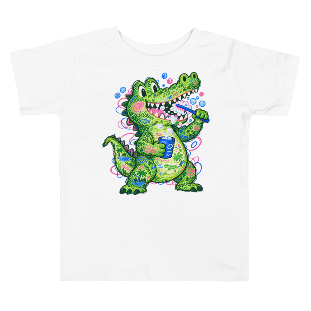 A Crocodile Carefully Brushing Its Many Teeth Toddler T Shirt in White