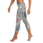 a person's legs and leggings with a floral design